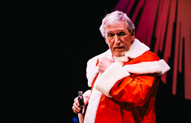 Father christmas with a whiskey bottle